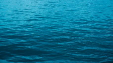 Tranquil Blue Waves on Water Surface wallpaper