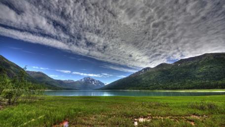 Majestic Reflections of Lake Eklutna in Alaska's Wilderness wallpaper