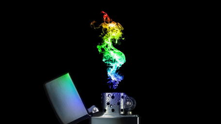 Colorful Flame Rising Above Lighter wallpaper