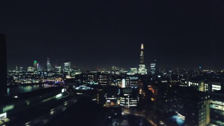 City Lights Illuminate the Night Sky wallpaper