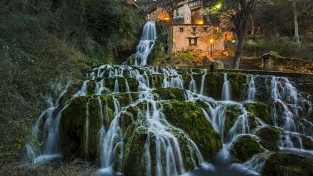 Cascading Beauty by the House wallpaper