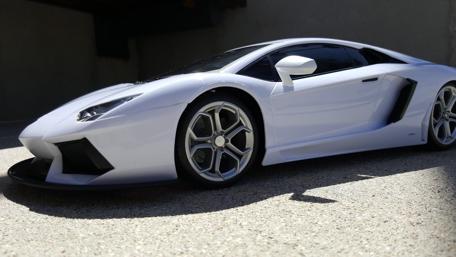 Sleek White Lamborghini Aventador Wallpaper wallpaper