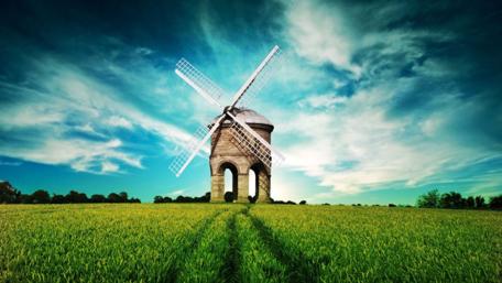 Whimsical Dutch Windmill Under a Vast Sky wallpaper