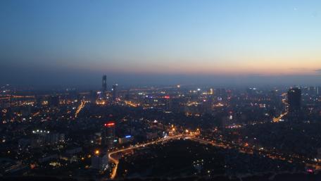 Stunning Twilight Over Hanoi City Lights wallpaper
