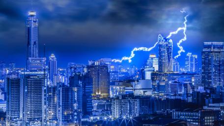 Electric Fury Over Urban Skyline wallpaper