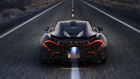 Speeding Supercar on Highway Twilight wallpaper