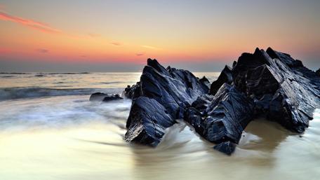 Serene Coastal Landscape at Sunset wallpaper