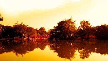 Golden Serenity at Ho Guom Lake wallpaper
