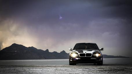 Ultimate BMW Experience Under Dramatic Skies wallpaper