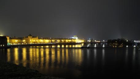 Stunning Nighttime View of Prague Riverfront wallpaper