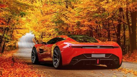 Vibrant Autumn Road with a Luxurious Dream Car wallpaper