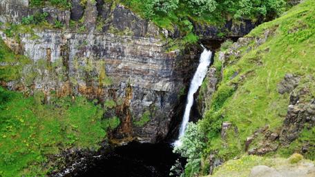 Majestic Scottish Waterfall Escape wallpaper