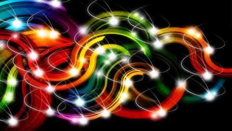 Vibrant Swirls of Light and Colorful Energy wallpaper