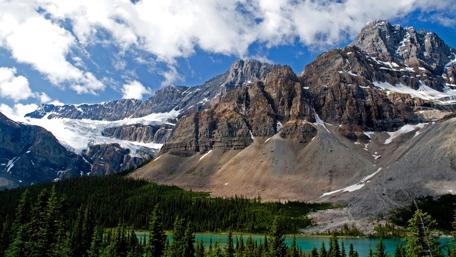 Majestic Canadian Mountains Under Bright Sky wallpaper