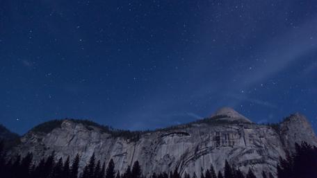 Majestic Yosemite Under a Starry Night Sky wallpaper