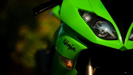 Vibrant Green Ninja Motorbike Wallpaper wallpaper