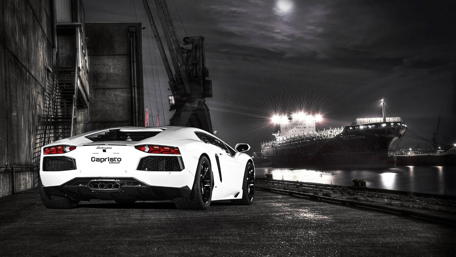 Sleek Monochrome Lamborghini by the Harbor at Night wallpaper