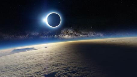 Cosmic Eclipse Above Earth wallpaper
