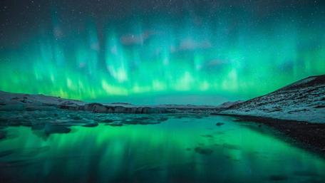Enchanted Borealis over Icelandic Serenity wallpaper