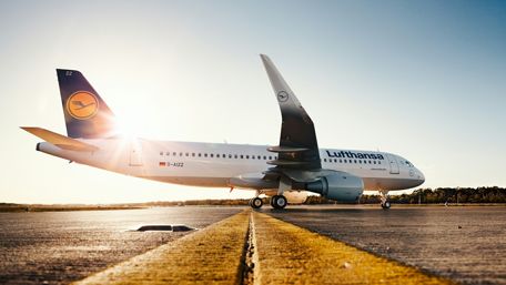 Airbus A320 Awaits Takeoff in Sunrise Glory wallpaper
