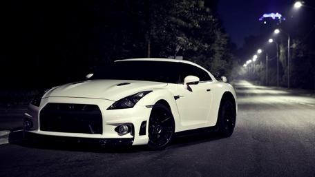 Midnight Majesty Nissan GTR on a Solitary Street wallpaper