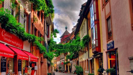 Quaint European Street in Vibrant Colors wallpaper