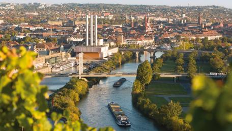 Würzburg's Serene Riverside View in Autumn wallpaper