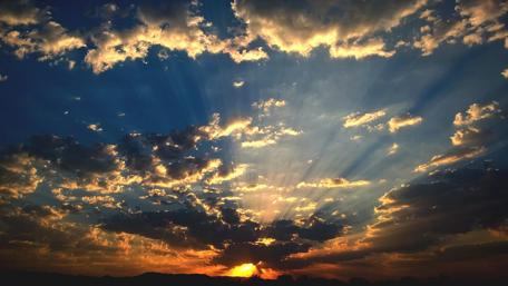 Stunning Sunset with Radiant Sky and Clouds wallpaper