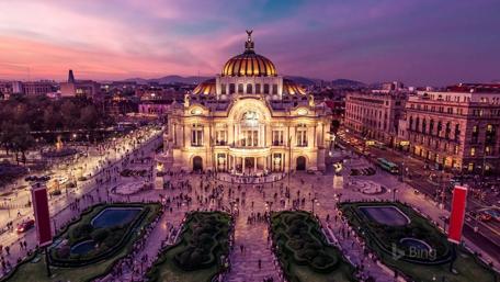Purple Twilight Over Mexico City's Arts Palace wallpaper