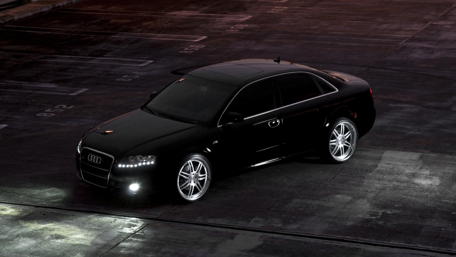 Sleek Audi in Urban Night Glow wallpaper