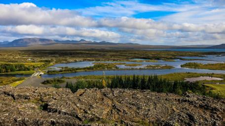 Majestic Icelandic Landscape with Clouds Above wallpaper