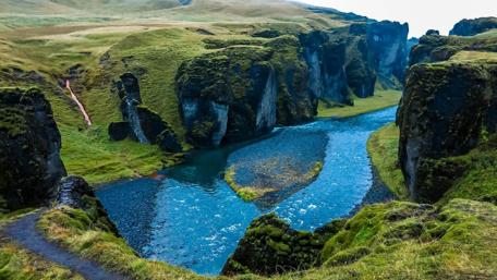 Majestic Valley with Flowing River and Cliffs wallpaper