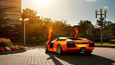 Lamborghini Murcielago in Stunning Orange Glow 4K Wallpaper wallpaper