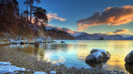 Serene Snowy Lake Landscape at Sunset wallpaper