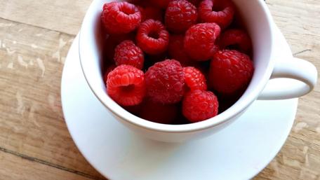 Fresh Raspberries in a Charming Cup wallpaper