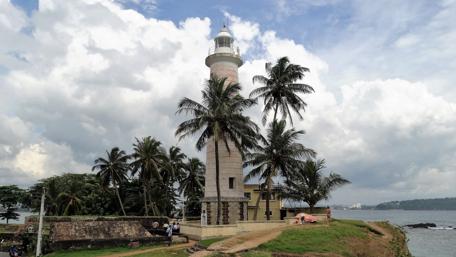 Sri Lankan Lighthouse Amidst Palms wallpaper