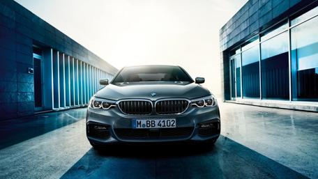 Sleek BMW Elegance in a Modern Setting wallpaper