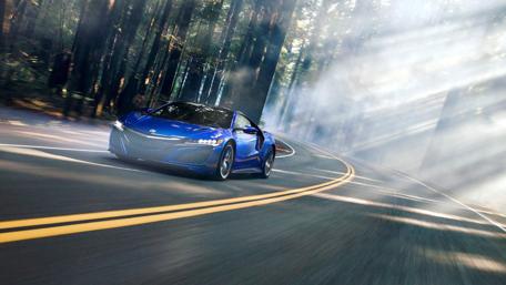 Acura NSX Glides Through Sunlit Forest Road wallpaper