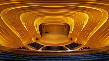 Elegant Theater Interior with Warm Lighting wallpaper
