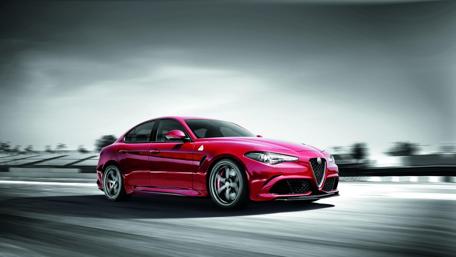 Dynamic Red Alfa Giulia in Monochrome Elegance wallpaper