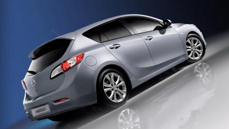 Sleek Mazda Hatchback Wallpaper for Automotive Enthusiasts wallpaper