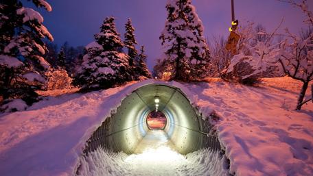 Winter Wonderland Tunnel Scene Displaying Snowy Serenity wallpaper