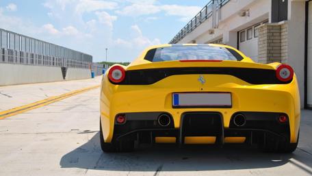 Bold Ferrari Power on Track wallpaper