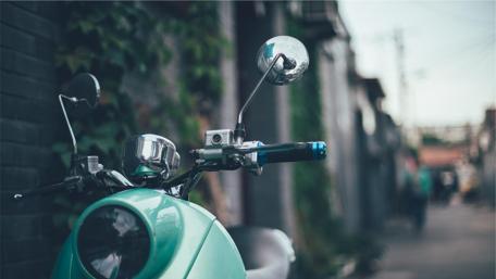 Vintage Motorbike in Urban Alleyway wallpaper