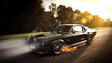 Blazing Ford Mustang on Golden Hour Asphalt wallpaper