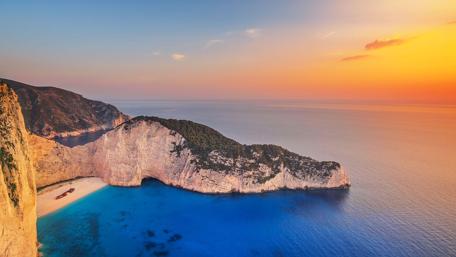 Sunset Serenity at Navagio Bay in Greece wallpaper