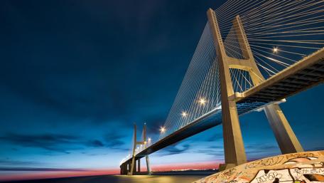 Modern Bridge Illuminated at Night wallpaper