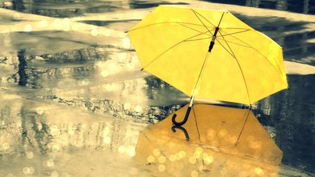 Bright Umbrella on a Rainy Day Scene wallpaper