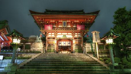 Ancient Temple Illuminated at Night wallpaper