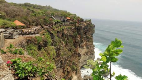 Breathtaking Cliffside View of Bali Coastline wallpaper